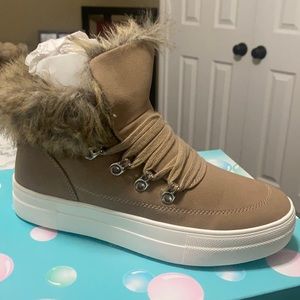 New, never worn lace up ankle boots. Size 7